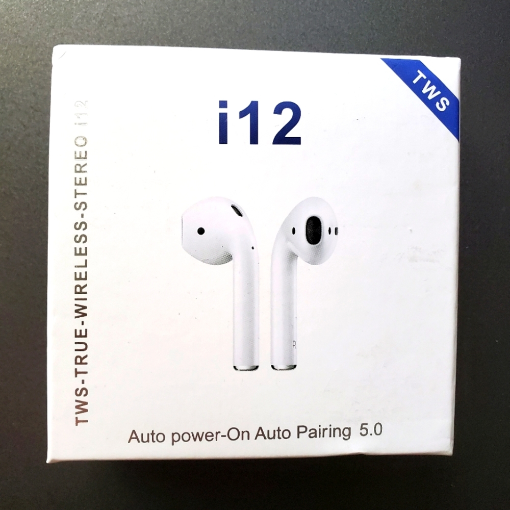 NIB White Wireless Auto-syncing earbuds Apple & Android compatible w/charge case